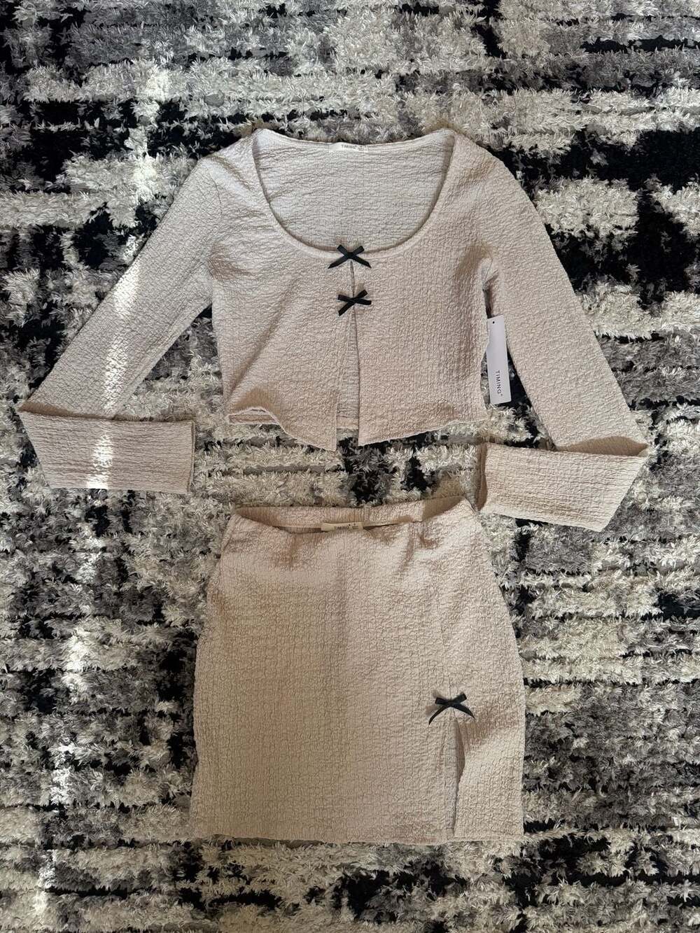 TIMING Textured Long Sleeve Crop Top and Mini Skirt Set with Bow Accents